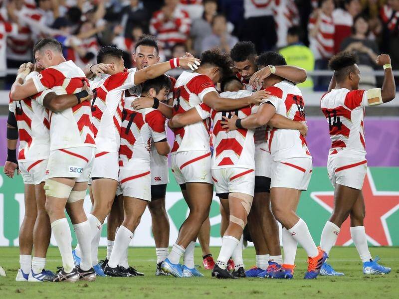 Japan are set to play their first-ever World Cup quarter-final after beating Scotland 28-12.