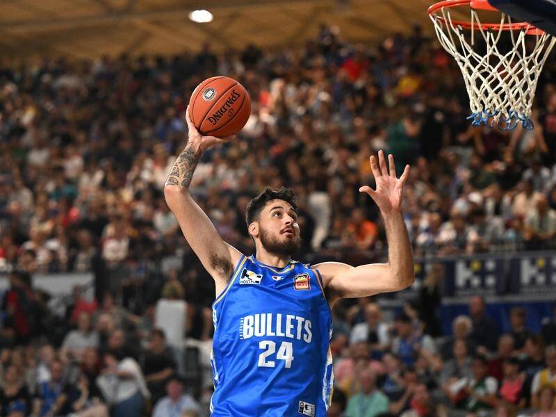 Tyrell Harrison played a crucial hand in lifting Brisbane to a narrow NBL win over Illawarra. (Darren England/AAP PHOTOS)