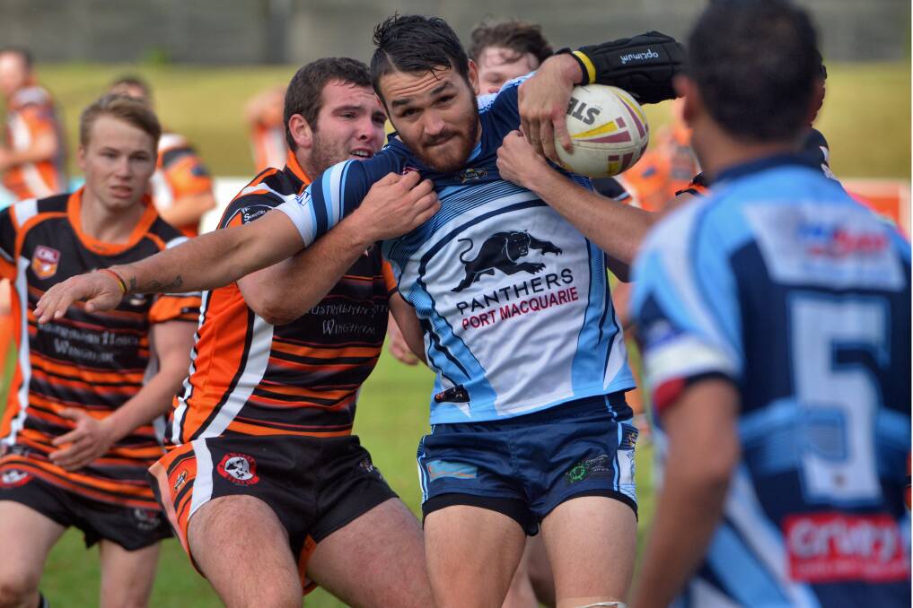 Ball and all tackle: Tom Dooker in action for the Port City Breakers on Saturday. Pic: MATT ATTARD