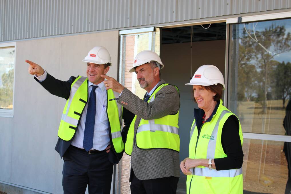 Checking on the work: Lake Cathie Primary School principal, Jock Garvin, Hastings Public School education director Mark Youngblutt and Port Macquarie MP Leslie Williams inspecting the new school last week.