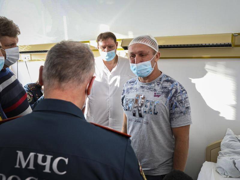 Russian officials say 60 people have been treated in hospital for injuries after a mine accident.