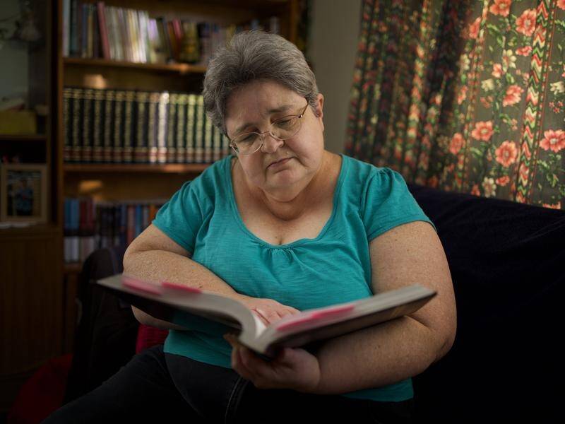 Juanita Hughes can study for a Masters degree but isn't allowed to drive due to her diagnosis.