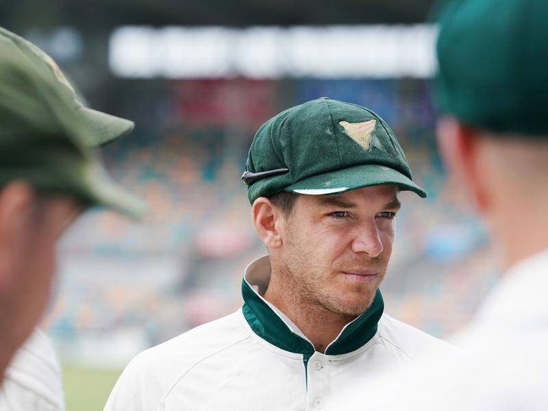 Test skipper Tim Paine (C) has come out in support of axed Cricket Australia CEO Kevin Roberts.