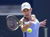 Simona Halep en route to beating Beatriz Haddad Maia in the Canadian Open final. (AP PHOTO)