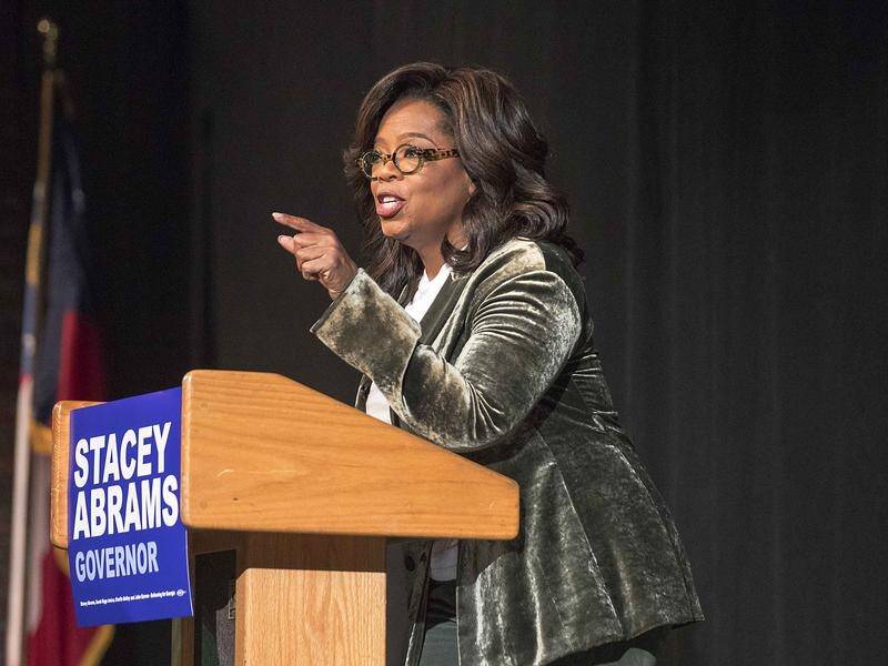 Oprah Winfrey has slammed racist robocalls sent in her name ahead of Georgia's vote for governor.