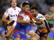 Anthony Milford in action for the Knights during their 36-12 defeat by the Broncos in Newcastle.