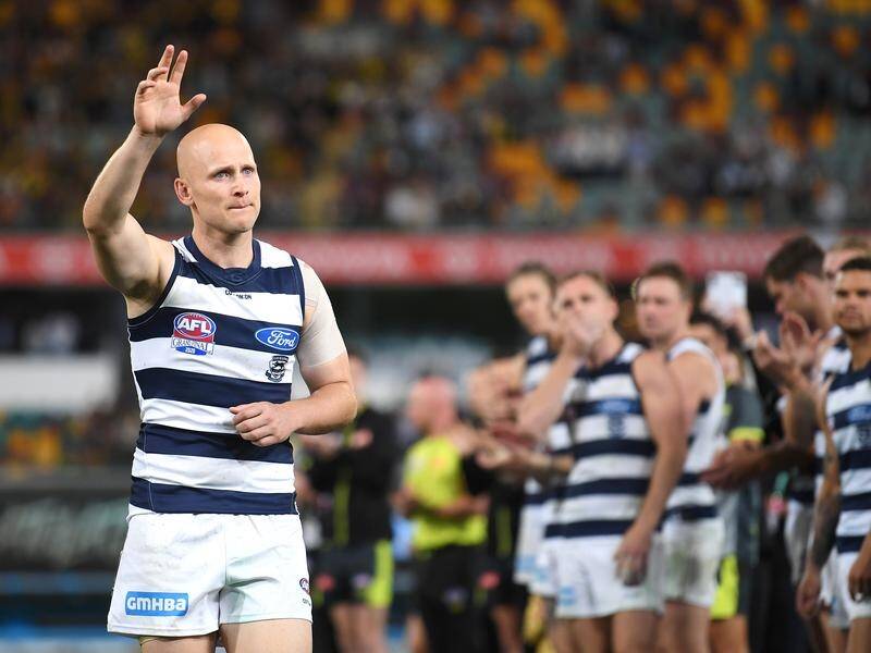Gary Ablett waves goodbye as he exits the field after Geelong's AFL grand final defeat to Richmond.