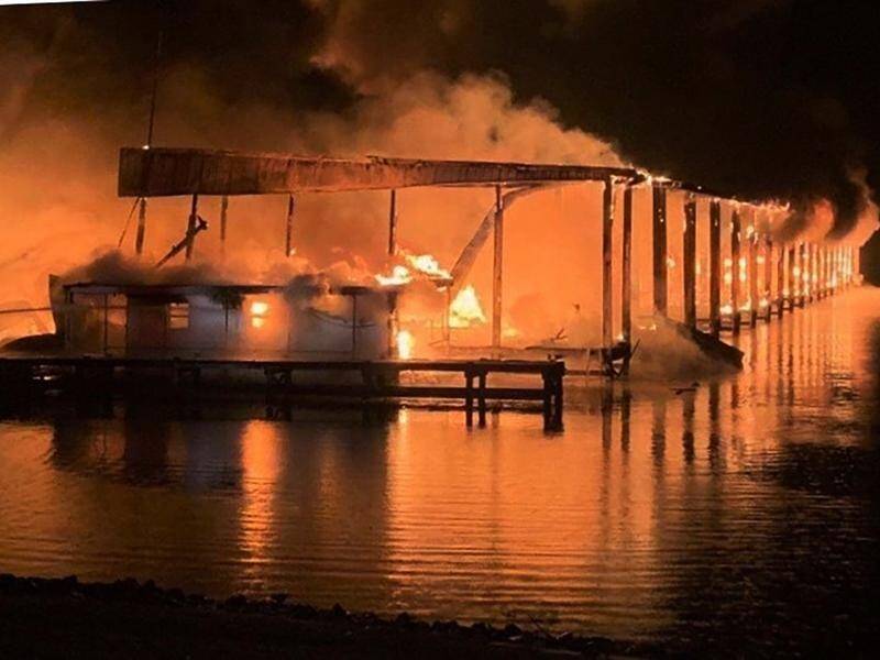 A fire that broke out after midnight at a marina in Alabama has killed at least eight people.