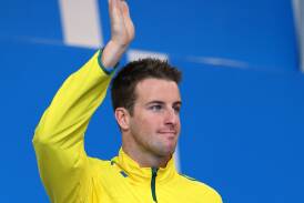 Top meet: James Magnussen salutes the crowd on the final night of swimming at Glasgow's Commonwealth Games. Pic: Getty Images
