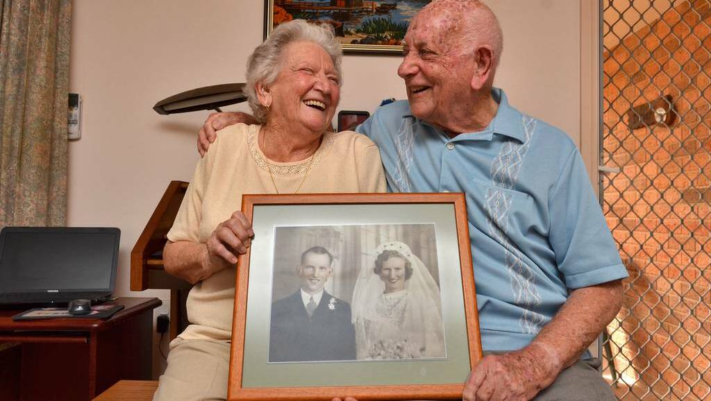 Seventy happy years: Norma and Ray Dewar celebrate 70 years of marriage with a smile and fond memories of their life together. Pic: PORT NEWS