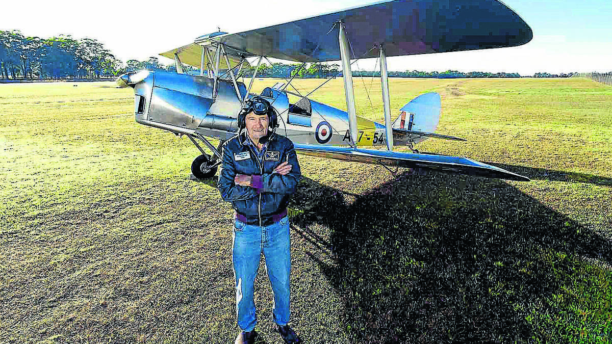 Brian Bignell recipient of the Royal Federation of Aero Clubs of Australia Federation Award, it's highest honour, on the grass strip at Taree Airport with his beloved DH 82 Tiger Moth. Pic: Ashley Cleaver 