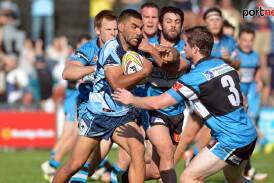 Big run: Richie Roberts on the charge for the Port City Breakers in last season's Group 3 grand final.