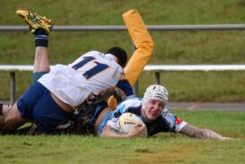 He's over: Mitch Turrell scores the winning try for Port City Breakers on Sunday. Pic: MATT McLENNAN