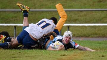 He's over: Mitch Turrell scores the winning try for Port City Breakers on Sunday. Pic: MATT McLENNAN