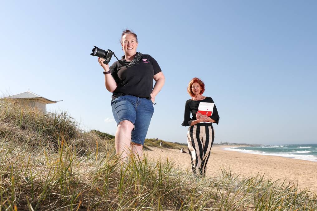 Mirco wedded bliss: That Moment Photography's Bec Owen and marriage celebrant Debbie Moroney prepare for a Fairy Meadow beach wedding. Picture: Adam McLean.