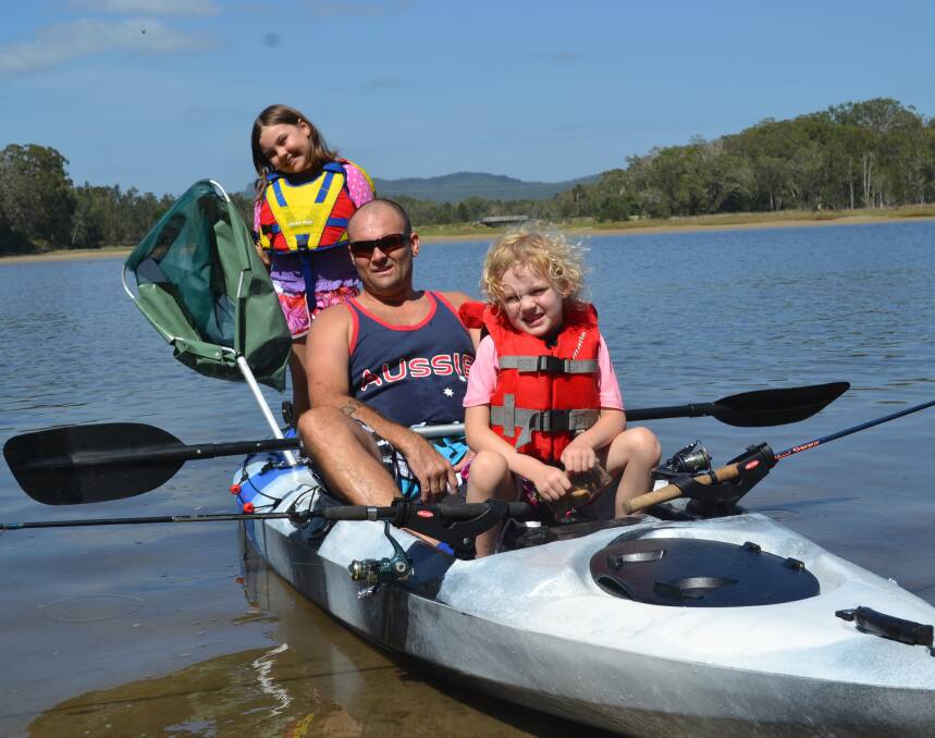 ADVENTURING: Caine Jenkin with daughters Ella-Yindi and Angel on Sunday, about to set off on Cathie Creek to catch flathead.
