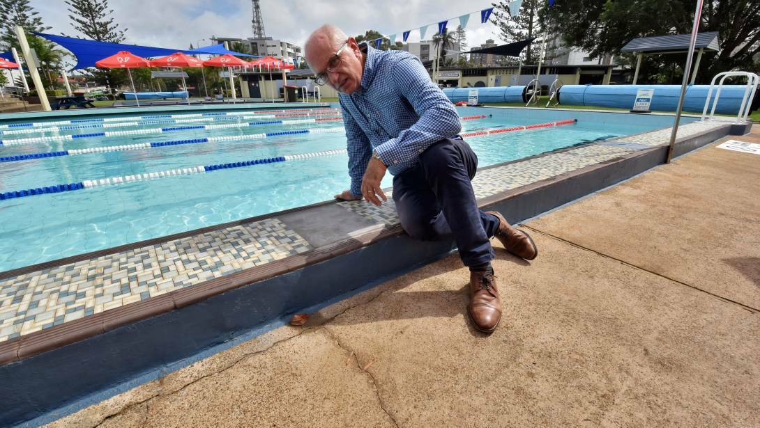 Needs some work: Greg Freeman inspecting the existing, and outdated, Olympic Pool.