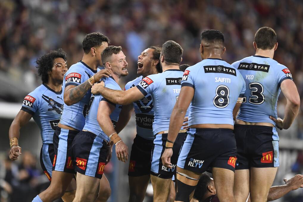 MEMORABLE: Laurie Daley described Wednesday night's victory as one of the greatest Origin performances from a NSW side. Photo: Ian Hitchcock/Getty Images
