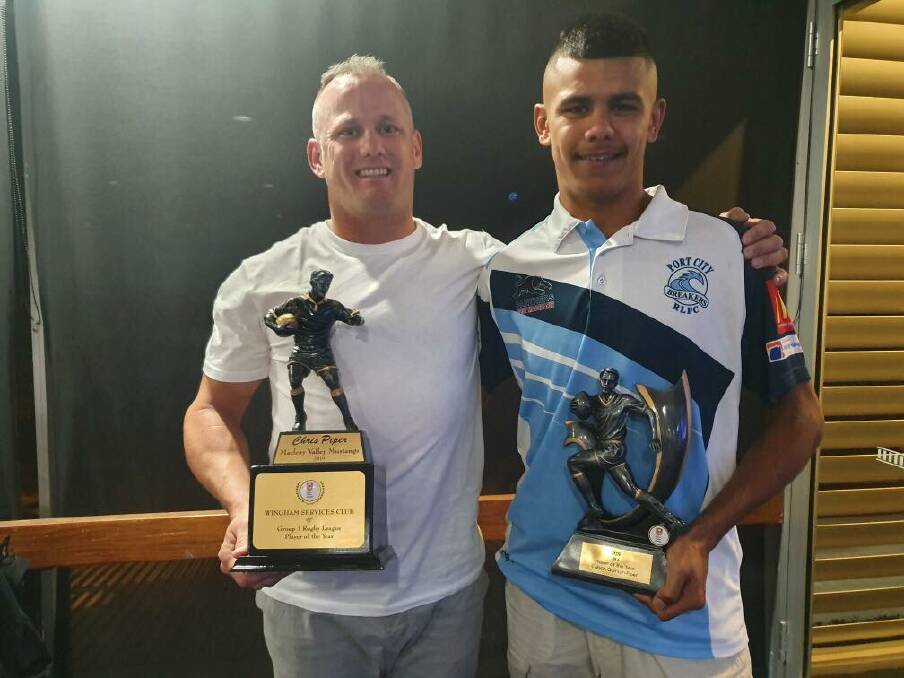 Macleay Valley Mustangs backrower Chris Piper with his son Cuban, who were awarded first grade and Under-18.5s Player of the Year honours, respectively. Photo: Supplied