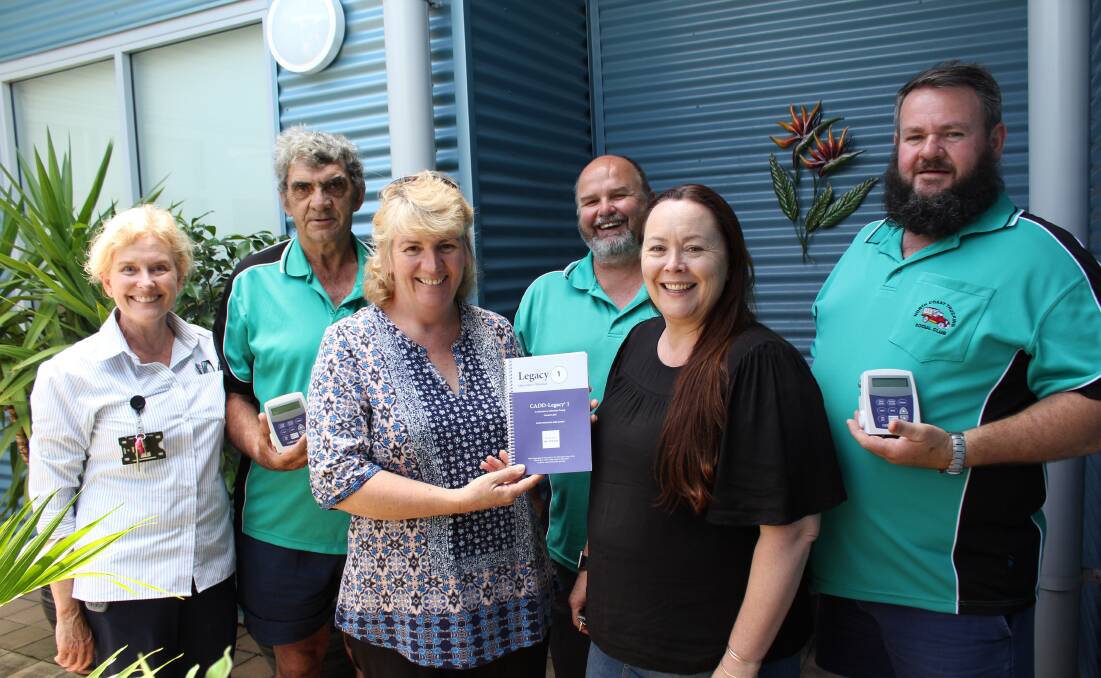 North Coast Trucking Social Club members Graham Green, Cathie Scott, Peter Scott, Tricia Homburg and Andrew Homburg present the much-appreciated CADD pumps for cancer patients to Nursing Unit Manager Jenny Baroutis.