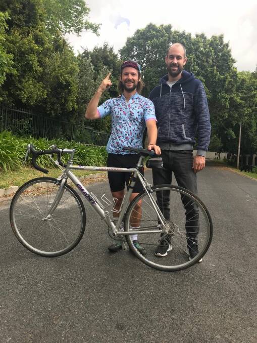 On his bike: David Blackburn with his brother, Peter. David will ride from Brisbane to Sydney for charity.