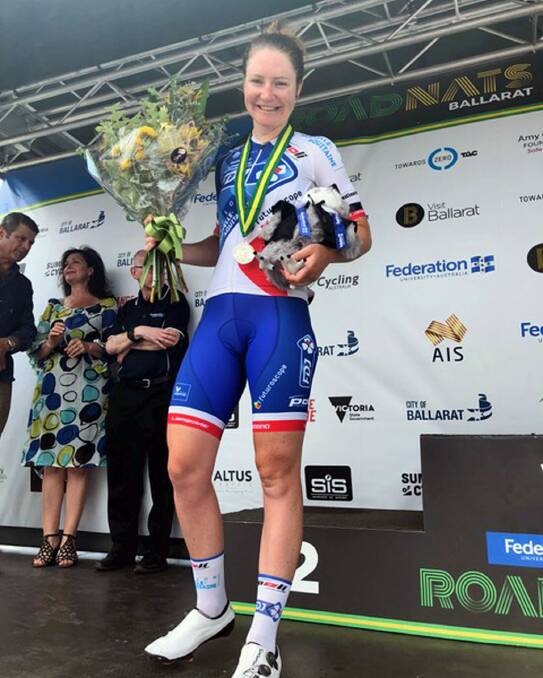 Great placing: Port Macquarie's Lauren Kitchen on the podium after claiming second place at the Australian National Road race championships in Victoria. Photo: Nick Kitchen