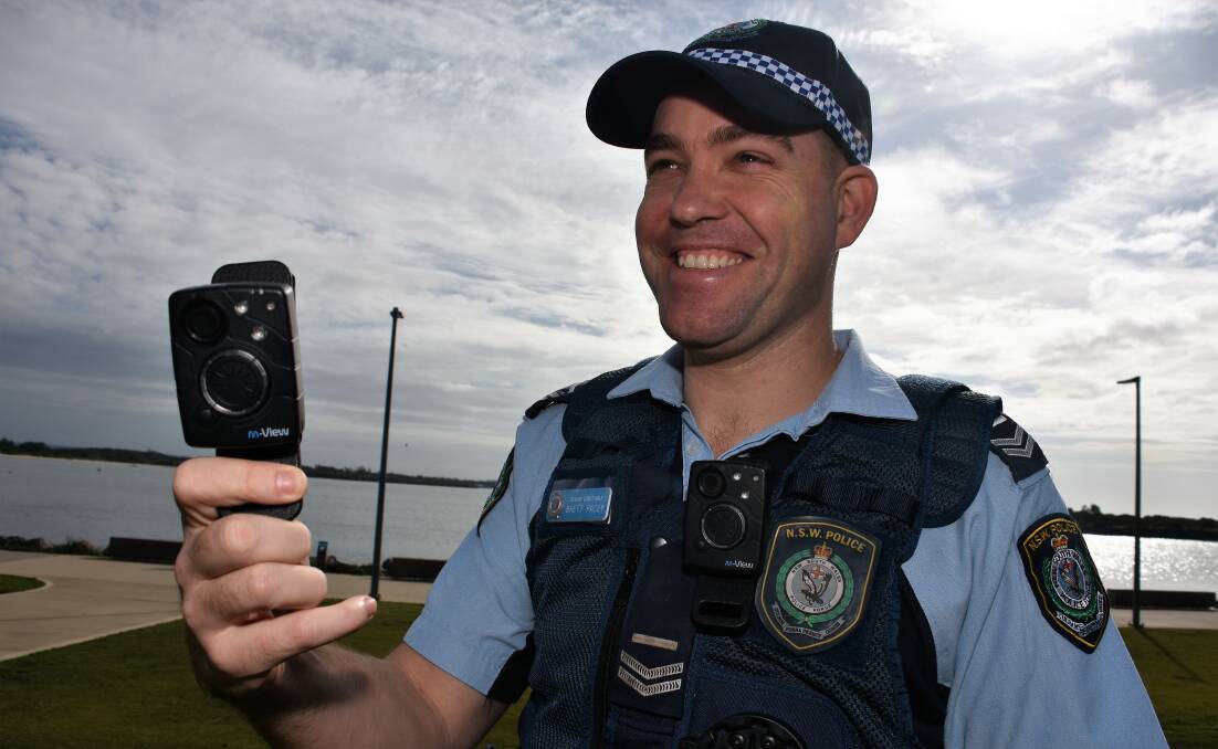 Action: Senior constable Brett Pacey models the new camera police will wear on the Mid North Coast. Photo: Matt Attard