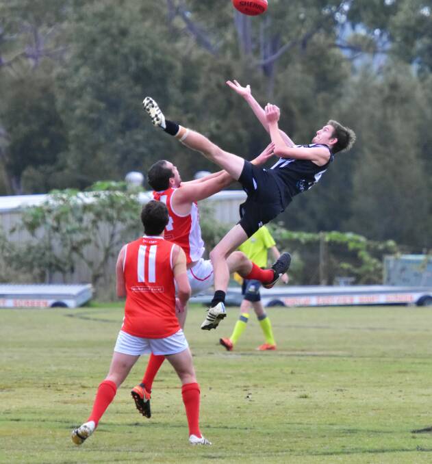 Flying high: Luke Boxhall goes big at the bounce. Photo: Ivan Sajko