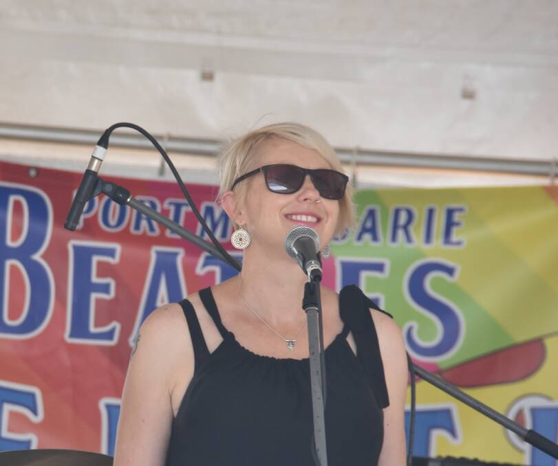 Born to perform: Elizabeth Robinson performs on stage at Westport Park during the Port Macquarie Beatles Festival. Photo: Ivan Sajko