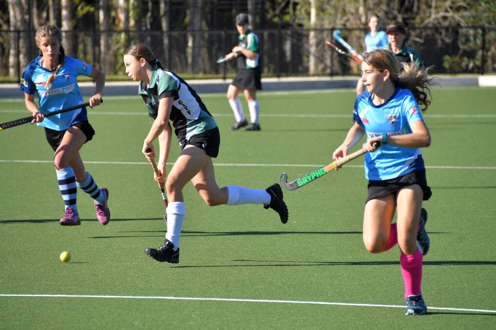 On the charge: Lily Burgman takes it forward for the Thunder. Photo: Ivan Sajko