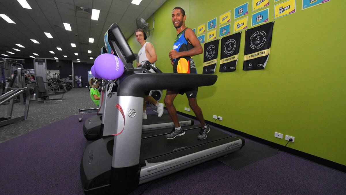 For a great cause: Matt Lees and Charlie Maher spend time on the treadmill. Photo: Ivan Sajko.