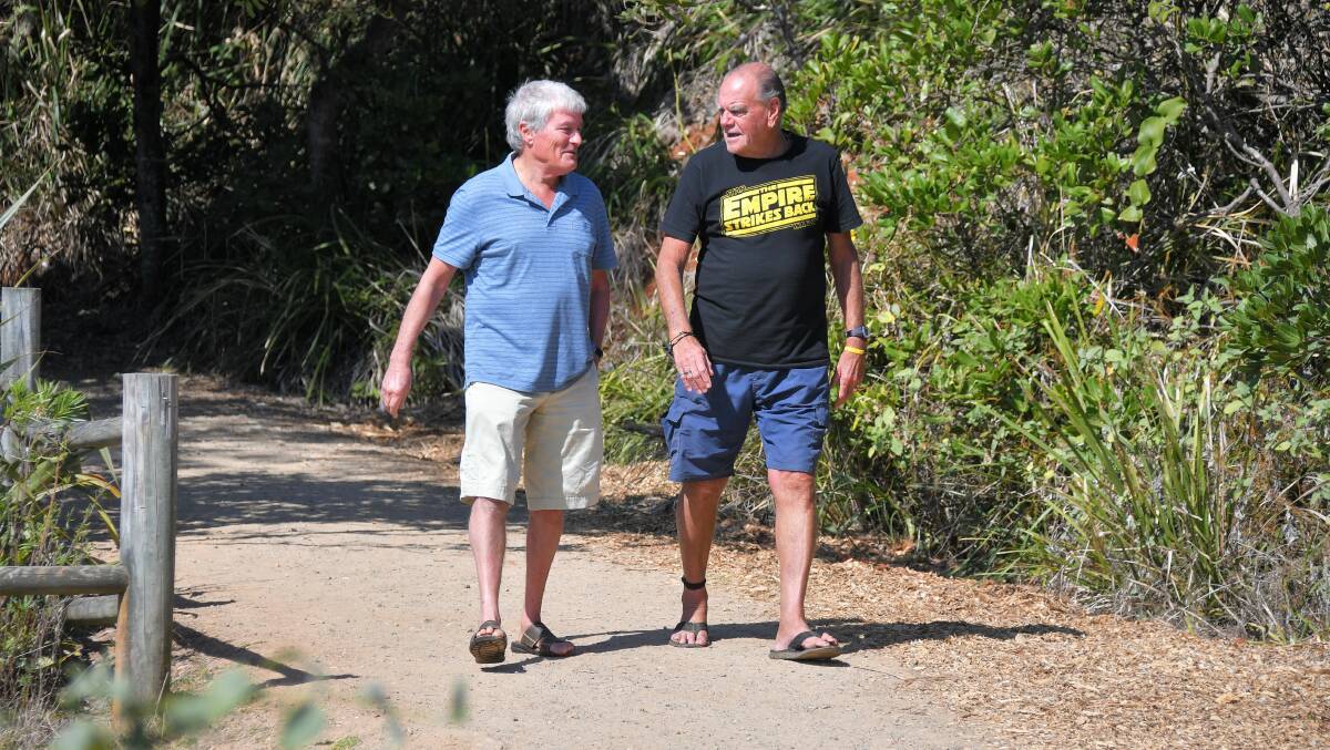 Catch ups: Brian and Jay chat at Shelly Beach after receiving bravery awards.