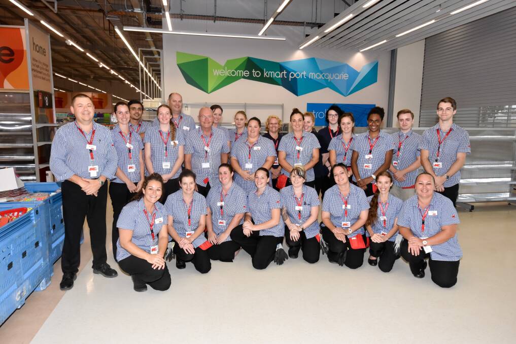 Meet the team: Just some of the Kmart Port Macquarie staff that are in-store now preparing for opening.