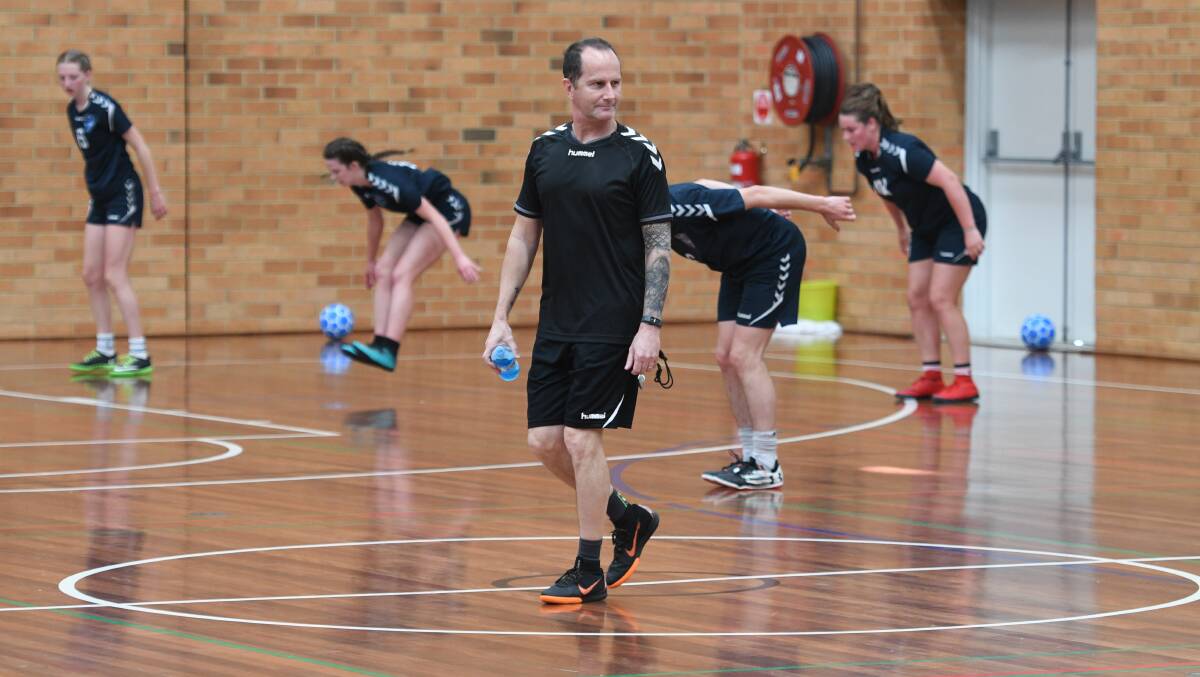 Mick Day oversees the Eagles' training on October 20.