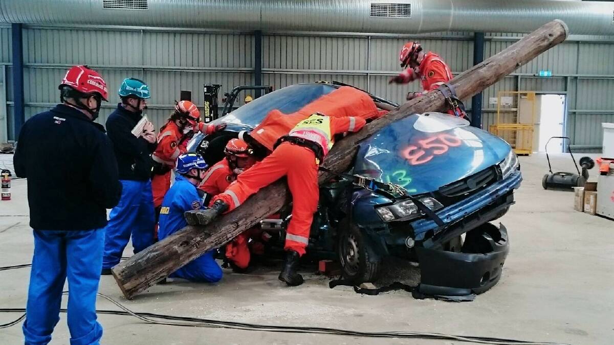 Tough rescue: Our SES crew in action during a staged rescue. Photo: supplied
