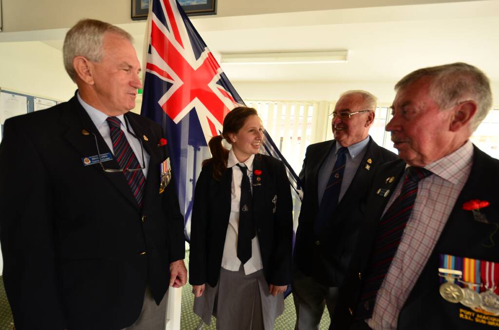 HEART FELT: Marley Palin from St Columba speaking at the Le Hamel Rememberance Day service with Brian Lewis, Bernie Power and Colin Clark.