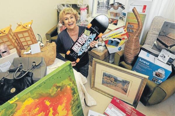 Speedy transport: With the ground she has covered selling raffle tickets and eliciting prizes and auction items from businesses, Hastings Cancer Trust fundraising committee chairwoman Betty Allman needs a skateboard to get around.