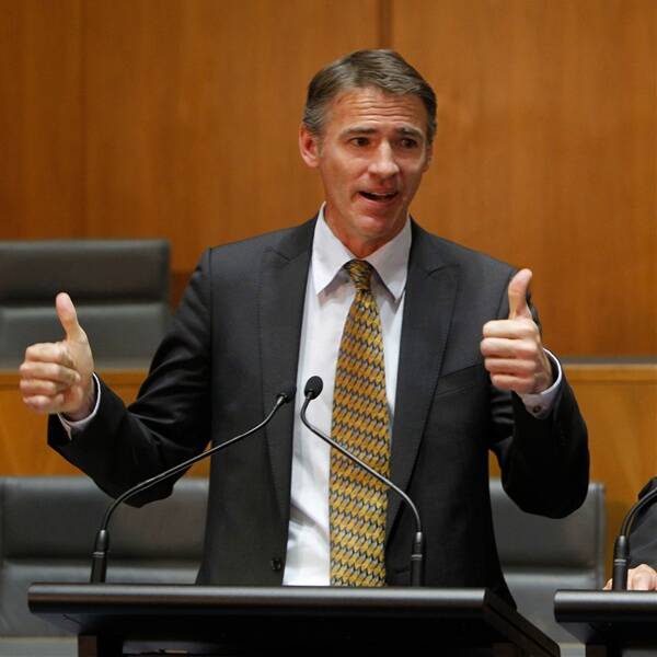 130 million reasons to smile: Lyne MP Rob Oakeshott addresses the nation in Canberra yesterday.  Pic: ANDREW MEARES