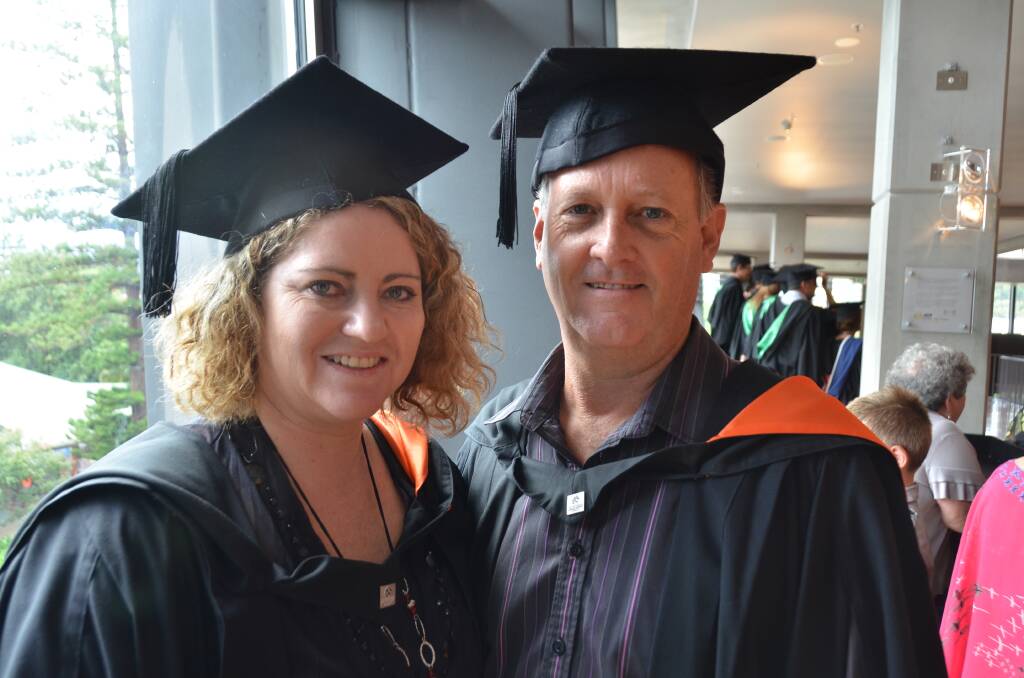 Dynamic duo: Robyn and Grant Woodland both graduate with a nursing degree.