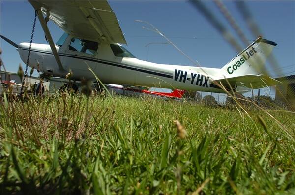 Wings clipped: CoastJet planes on the ground at Port Macquarie yesterday.
