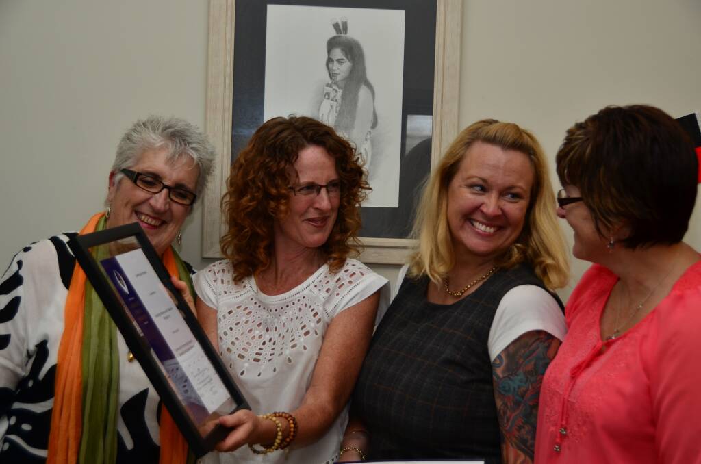 Project recognised: Kempsey's domestic violence specialist worker Narrelle Moulton, Hastings Women and Children's Refuge manager Gemma Morley, Community Partnerships Against Domestic and Family Violence project coordinator Kylie Temple and Taree's domestic violence specialist worker Tanya Keogh with the award.