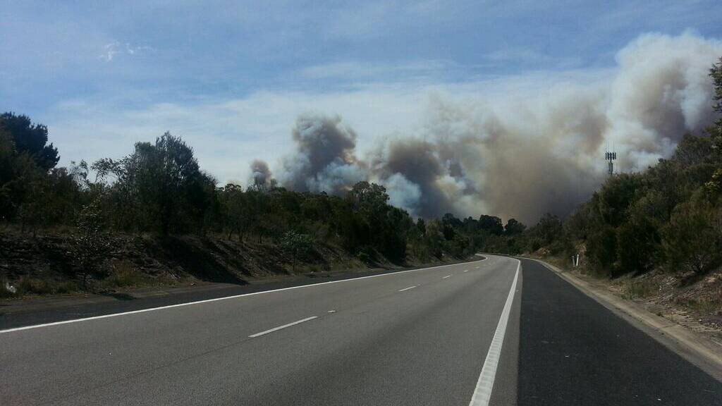 Fire has closed the Hume Highway, south of Sydney. Photo: EMMA BISCOE