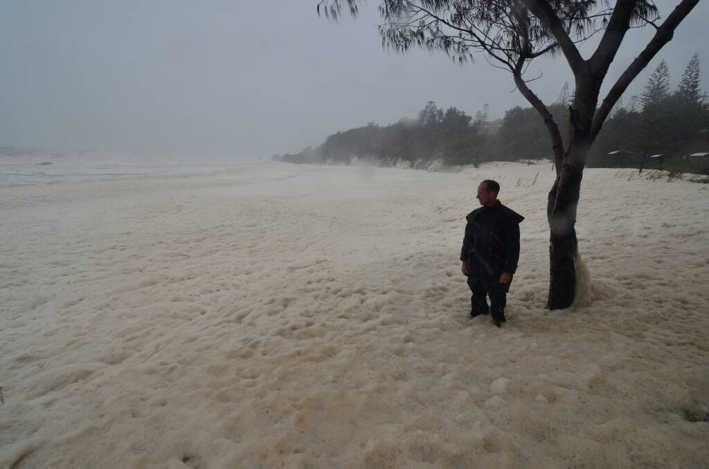The foam has been washing in at Oxley Beach in Port macquarie as the rain continues to fall and tides go up.