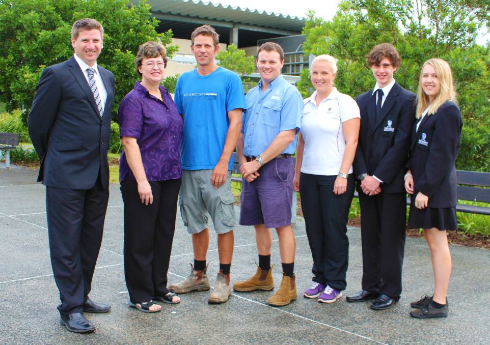 Newman College principal Stephen Pares, former students and teachers Mandy Meehan, Nic Watts, Peter Hayes, Renee Slade with 2013 captains Jake Hasler and Briget Smith.