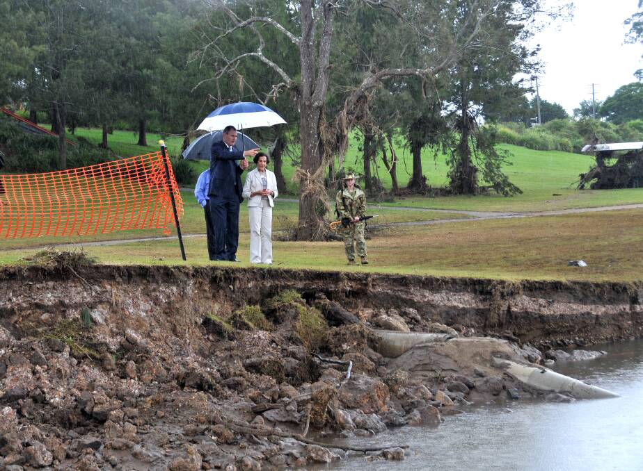 Port Macquarie-Hastings mayor Peter Besseling inspects flood damage near Wauchope with Acting Governor General Marie Bashir.