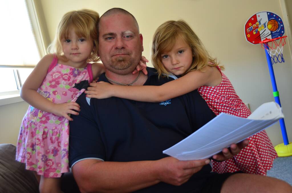 Give us a chance: Jason Lenane wants a job to help support his children Abbey and Mia.