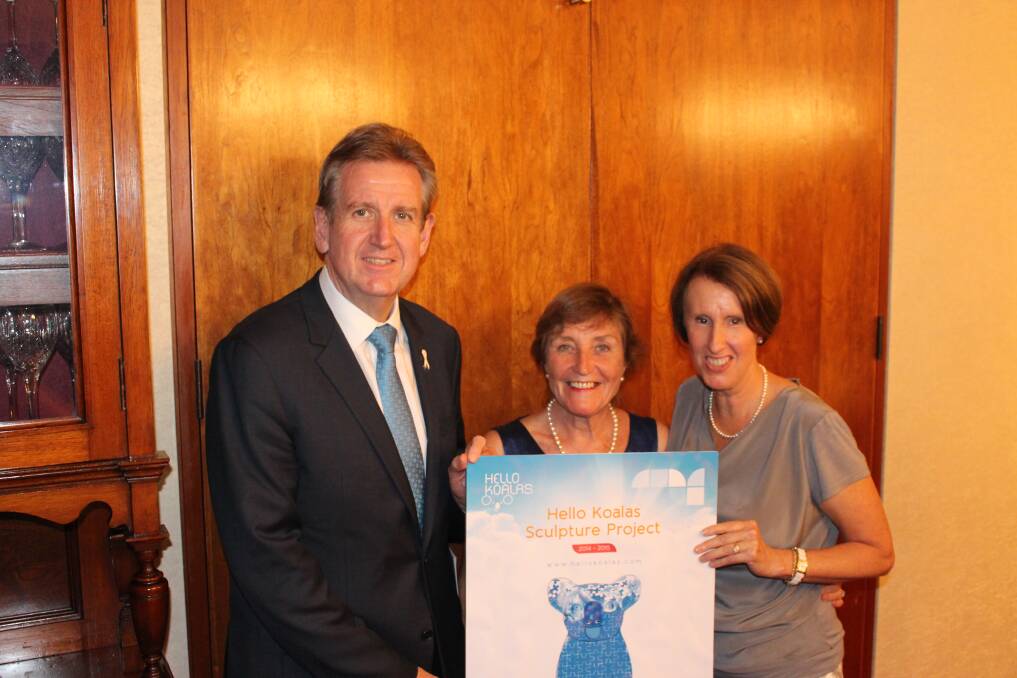 Government on board: NSW Premier Barry O'Farrell gives Arts and Health Australia executive director Margret Meagher and Port Macquarie MP Leslie Williams the good news the state government will sponsor the Dementia Koala.