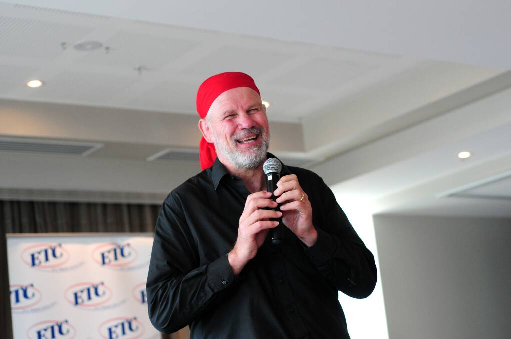 Delightful tales: Peter Fitzsimons has a laugh with the audience at Port Macquarie yesterday.