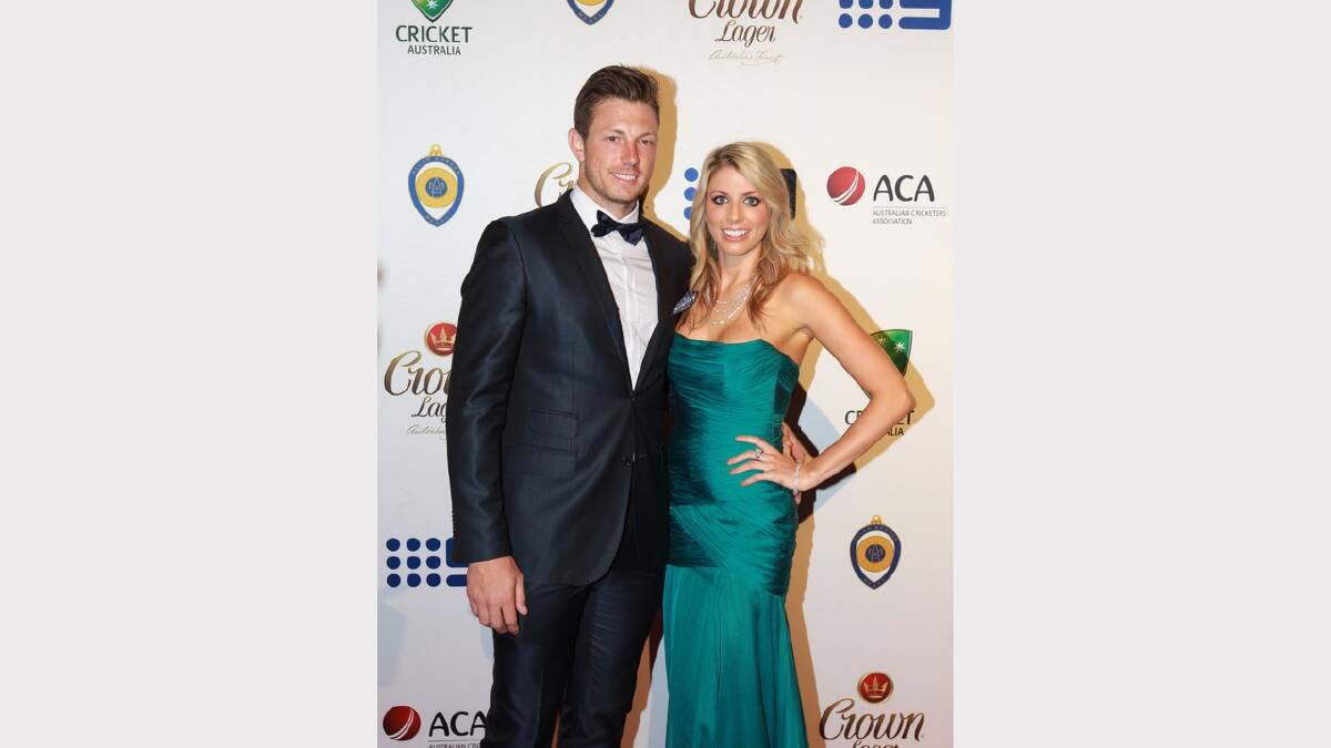  James Pattison and Kayla Dickson arrive at the 2014 Allan Border Medal on Monday night. Picture: Ben Rushton 