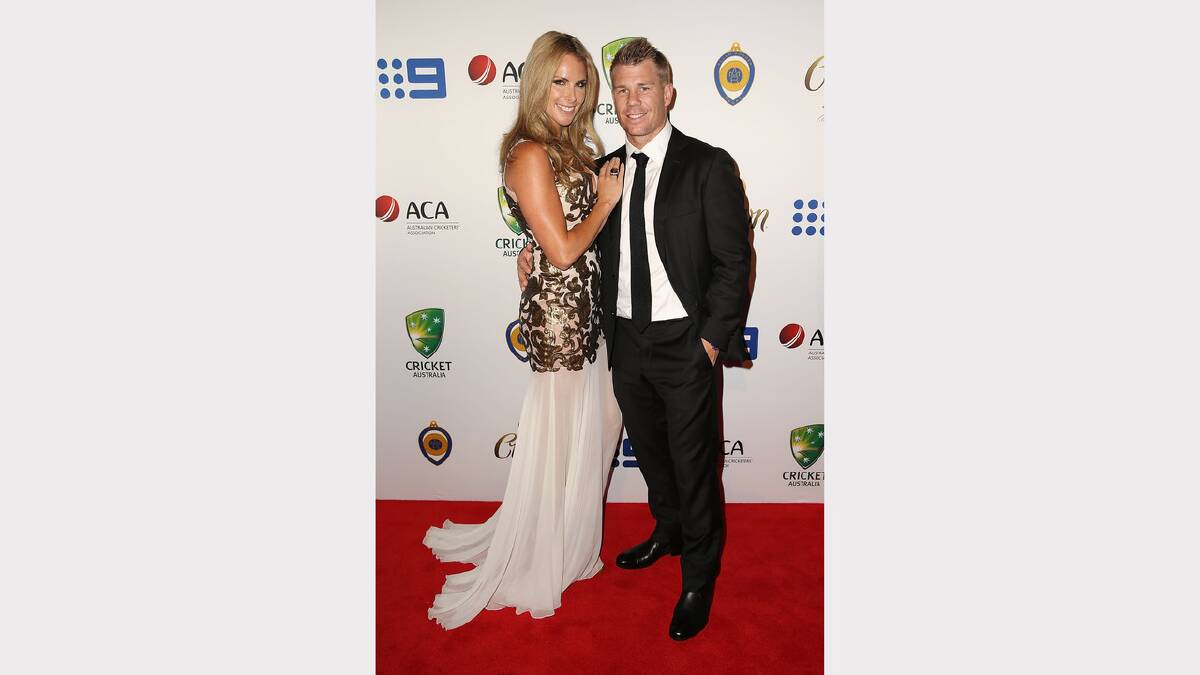 David Warner and Candice Falzon arrive at the 2014 Allan Border Medal  on Monday night. Picture: GETTY IMAGES